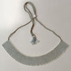 Anvi Shah's Beaded Necklace: White and Silver