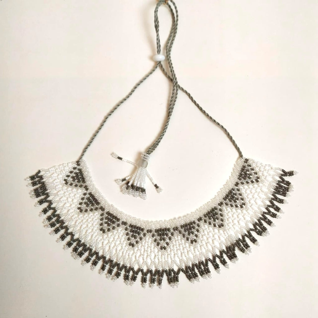 Anvi Shah's Beaded Necklace: White and Grey
