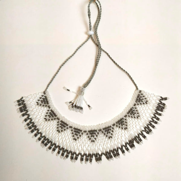 Anvi Shah's Beaded Necklace: White and Grey