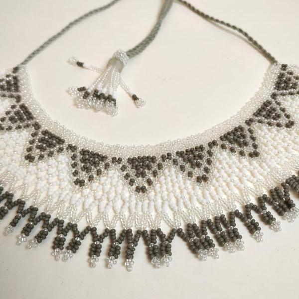 Anvi Shah's Beaded Necklace: White and Grey