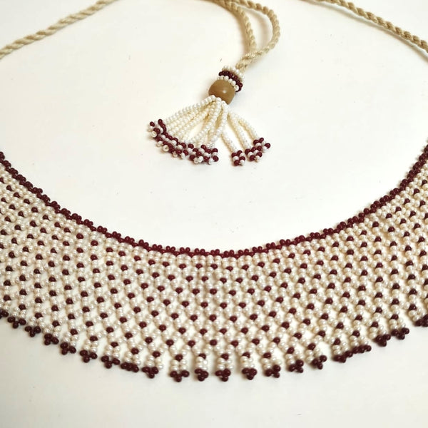 Anvi Shah's Beaded Necklace: White and Maroon
