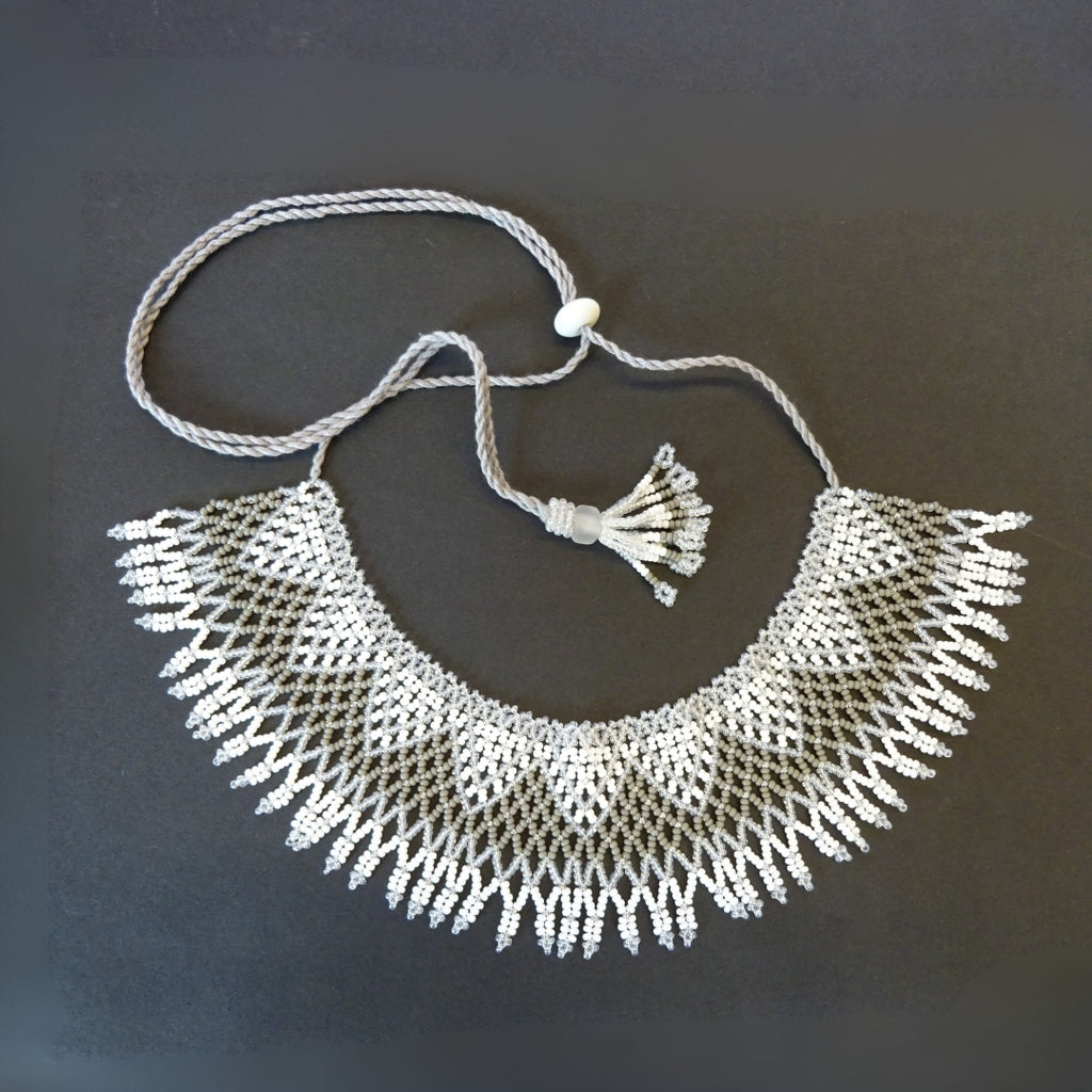 Anvi Shah's Beaded Necklace: White and Grey