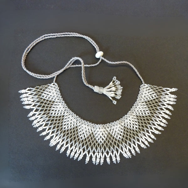 Anvi Shah's Beaded Necklace: White and Grey
