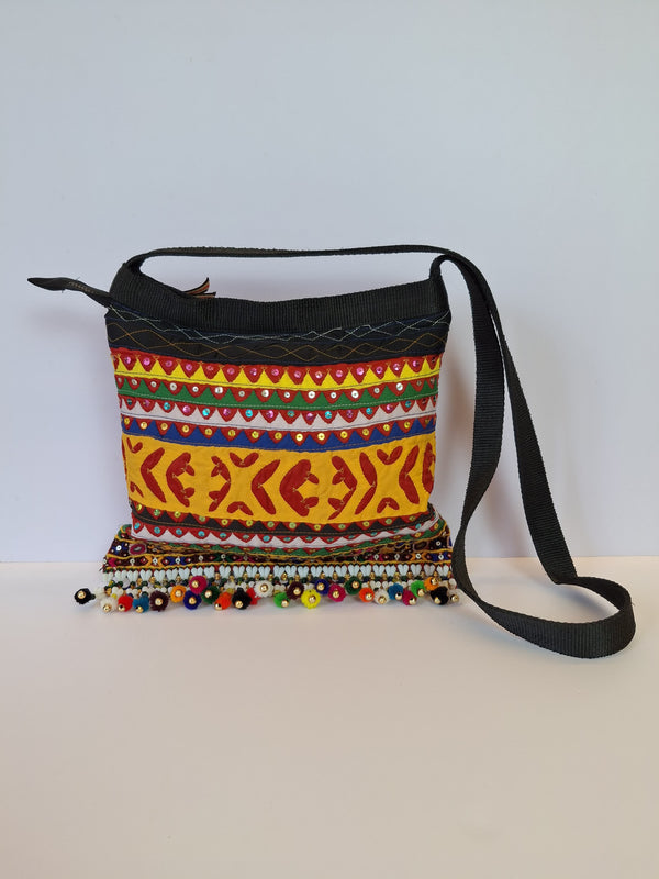 Applique, beaded cross body bag